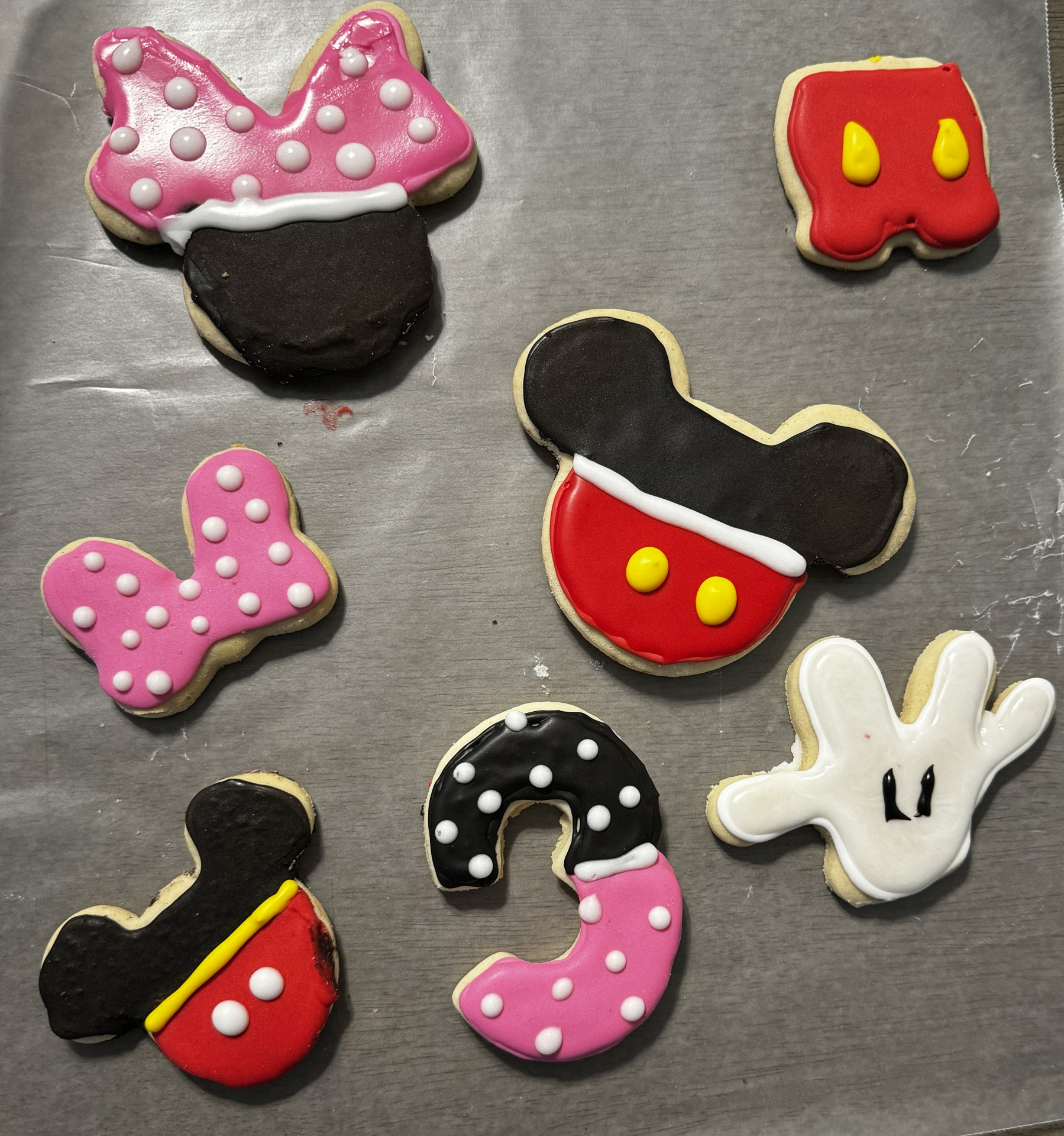 Custom decorated Minnie and Mickey Mouse themed sugar cookies